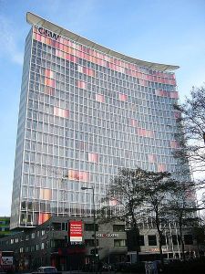 GSW Headquarters building in Berlin. The windows are polychromatic pastel hues of orange and rose when the window shades are closed. Wikipedia